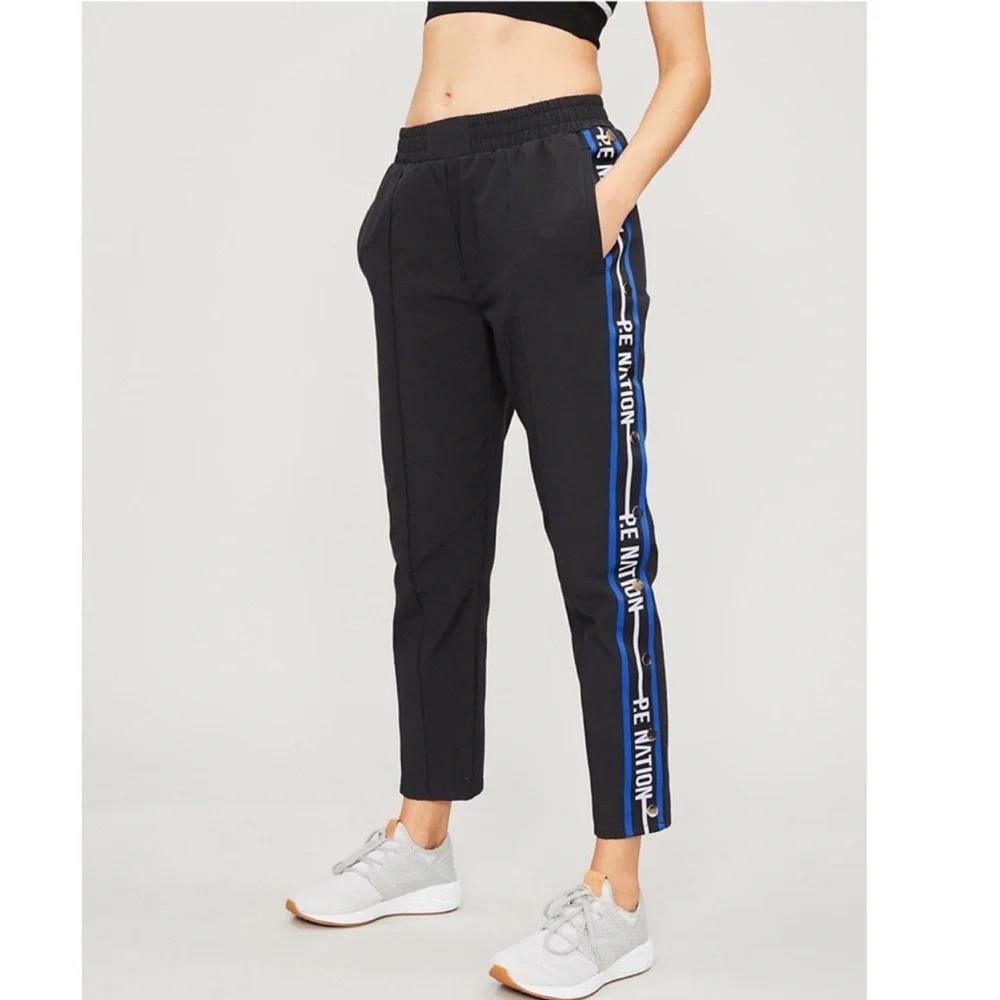 P.E Nation Torque Track Pants Snap Button Black Blue Stripe